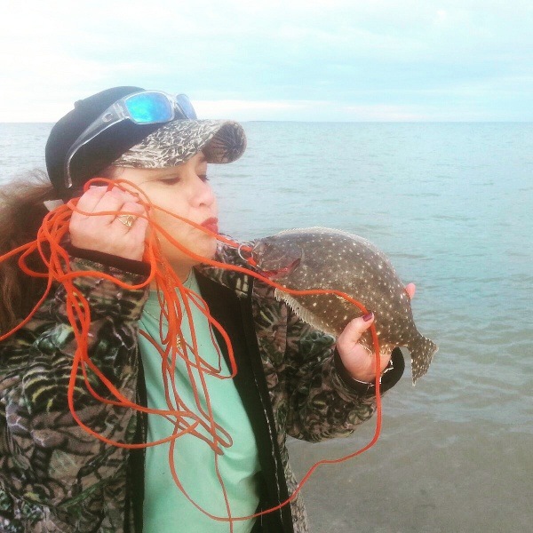Kissing that Flounder Lori at Port Isabell Tx,  Dec 2015